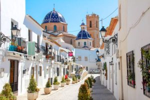 image002 Altea, Spain - May 2019: A traditional mediterranean street in Altea old town, Spain